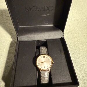 Movado Green leather and gold watch